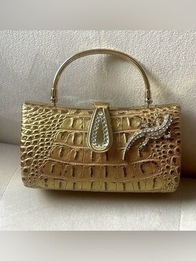 Iris Lane small gold clutch